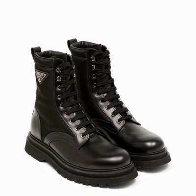Prada Logo-plaque Panelled Ankle Boots In Black