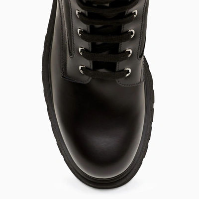 Prada Logo-plaque Panelled Ankle Boots In Black