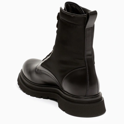 Prada Logo-plaque Panelled Ankle Boots In Black