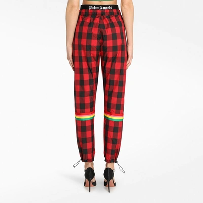 Shop Palm Angels Buffalo Checked Joggers In Red