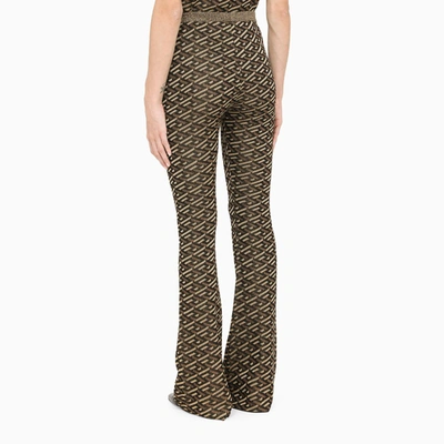 Shop Versace Metallic Jacquard La Greca Pants In Multicolor