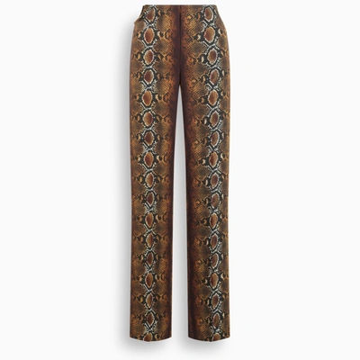 Shop Versace Phyton Print Trousers In Brown