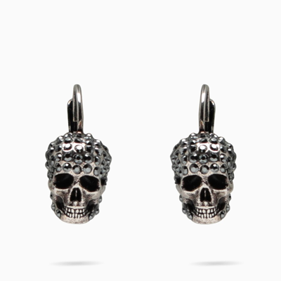 Shop Alexander Mcqueen Silver-tone Skull Earrings In Metal