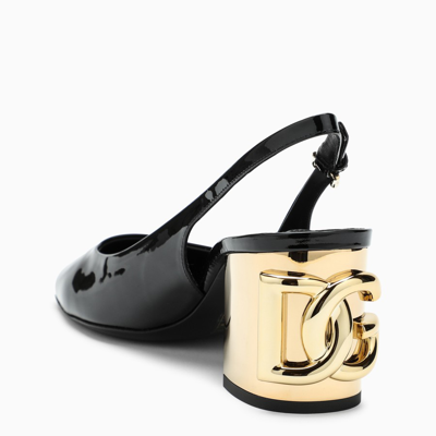 Shop Dolce & Gabbana Black Pumps With Gold Dg Heel