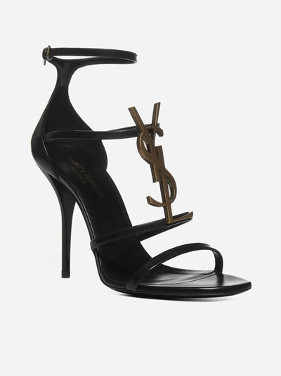 Shop Saint Laurent Cassandra Ysl-logo Leather Sandals In Black
