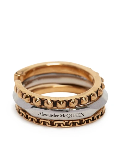 Shop Alexander Mcqueen Linked Rings In Antique Gold Silver