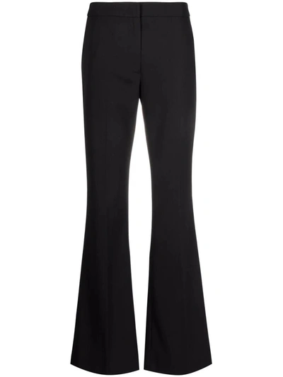 Shop Msgm Black Tailored High-waisted Flared Trousers In Nero
