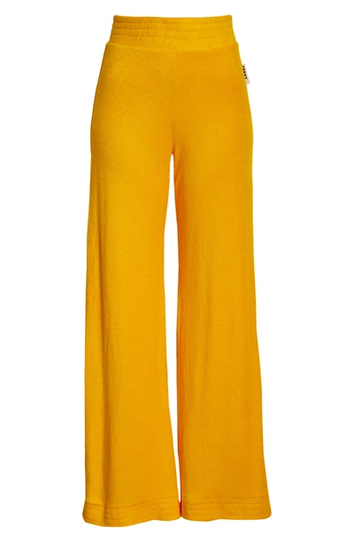 Shop Simon Miller Loa Terry Cloth Flare Pants In Yolk Yellow