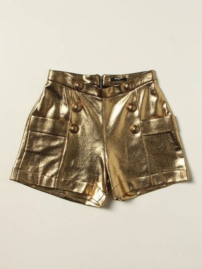 Shop Balmain Laminated Shorts In Gold