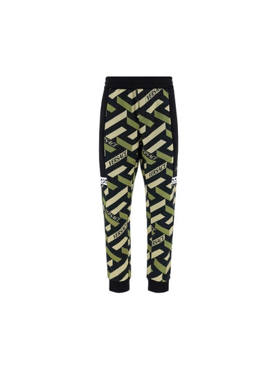 Shop Versace Combo Monogram Track Pants