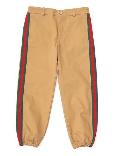Shop Gucci Kids Side Stripe Cuffed Track Pants In Beige