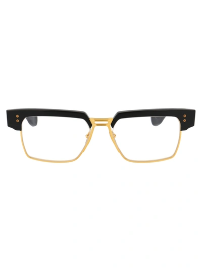 Shop Dita Hakatron Glasses In 01 Yellow Gold - Black W/ Clear