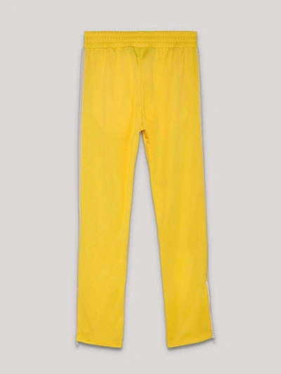 Shop Palm Angels Trousers Yellow