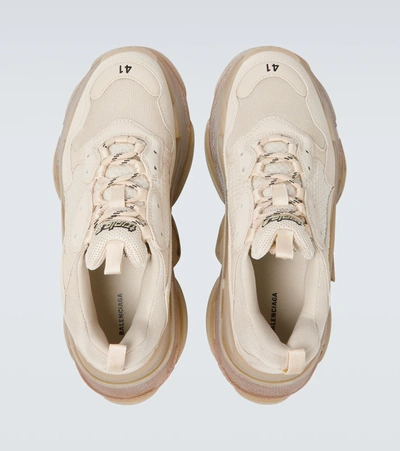 Shop Balenciaga Triple S Sneakers In Off White
