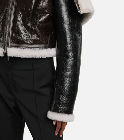Shop Givenchy Layered Leather And Shearling Jacket In Black/beige