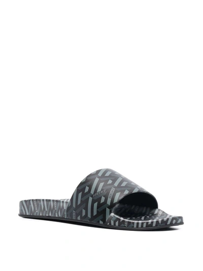 Shop Versace The Greca Flap Sandal Black And Grey