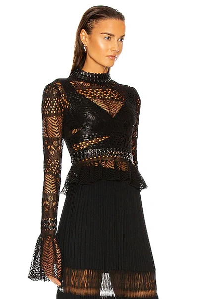 Alaïa Fitted Long Sleeve Top In Noir