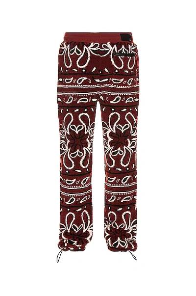 Shop Amiri Printed Bandana Polar Fleece Pants In Red & Black