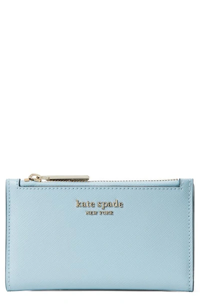 Shop Kate Spade Small Spencer Slim Leather Bifold Wallet In Teacup Blue
