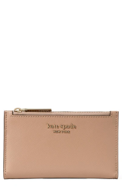 Shop Kate Spade Small Spencer Slim Leather Bifold Wallet In Raw Pecan