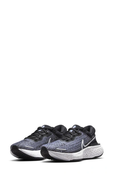 Shop Nike Zoomx Invincible Run Flyknit Running Shoe In White/ White/ Black
