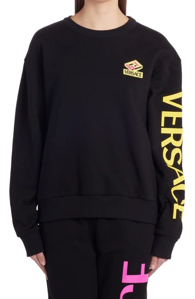 Shop Versace Neon Logo Graphic Sweatshirt In Black