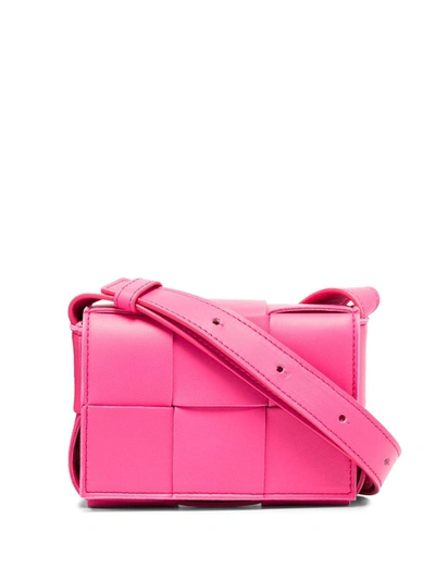 Shop Bottega Veneta Mini Cassette Crossbody Bag In Pink