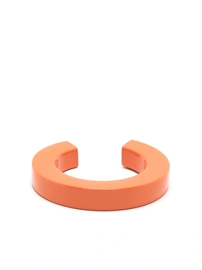 Shop Uncommon Matters Aperture Geometric Bangle In Orange