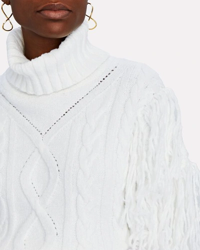 Shop Ronny Kobo Maram Fringed Cable Knit Turtleneck Sweater In Ivory