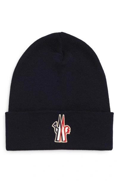 Shop Moncler Embroidered Logo Rib Wool Beanie In Navy