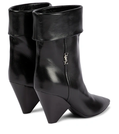 Shop Saint Laurent Niki 85 Leather Ankle Boots In Nero