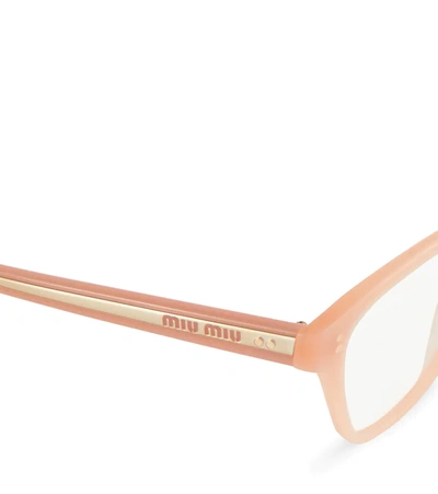 Shop Miu Miu Cat-eye Glasses In Pink