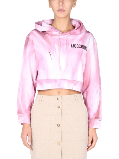 Shop Moschino Art Theme Cropped Sweatshirt In Rosa