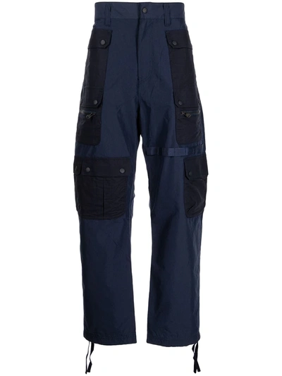 Shop White Mountaineering Multi-pocket Cotton-blend Parachute Trousers In Blue