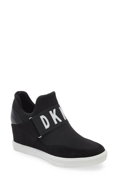 Shop Dkny Cosmos Wedge Sneaker In Black