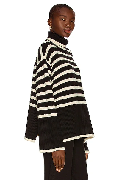 Shop Totême Signature Stripe Turtleneck Sweater In Black Stripe