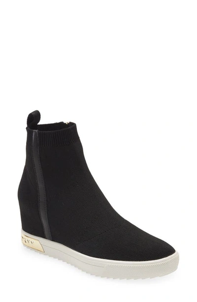 Shop Dkny Wedge Sock Sneaker In Black/ Gold