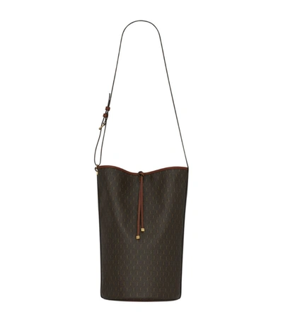 Shop Saint Laurent Le Monogramme Bucket Bag In Brown