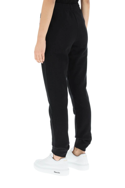 Shop Moschino Multicolor Logo Sweatpants In Black