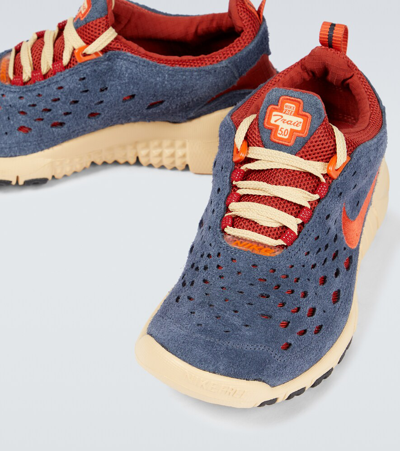 Shop Nike Free Run Trail Sneakers In Thunder Blue/orange-cinnabar