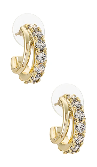 Shop Kendra Scott Livy Huggie Earrings In Metallic Gold