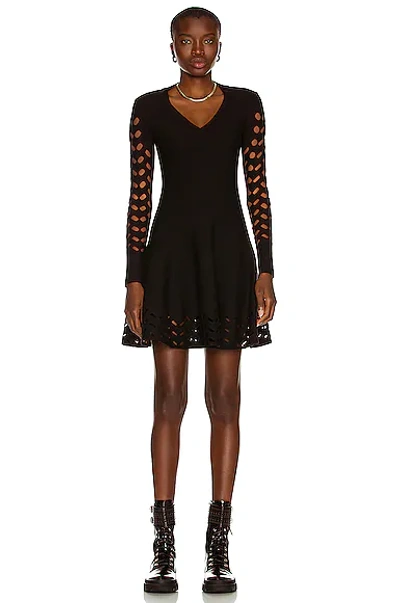 Shop Alaïa Long Sleeve Mini Dress In Noir