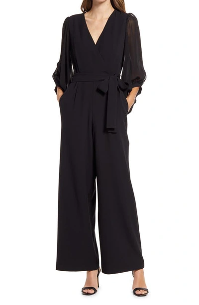Shop Donna Ricco Long Sleeve Wrap Jumpsuit In Black