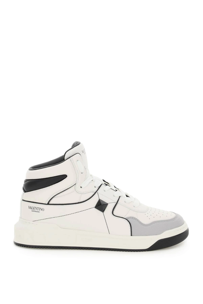 Shop Valentino One Stud Hi-top Sneakers In White,black,grey
