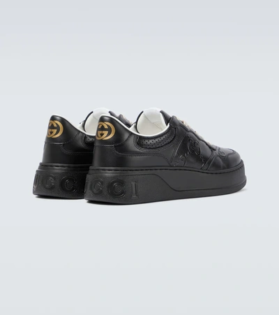 Shop Gucci Leather Gg-embossed Sneakers In Black/black/black/bl