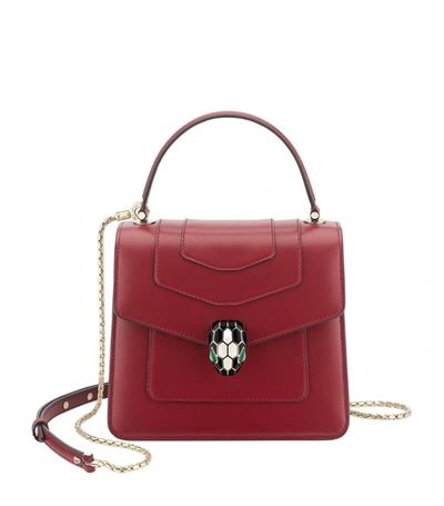 Shop Bvlgari Leather Serpenti Forever Top-handle Bag In Red