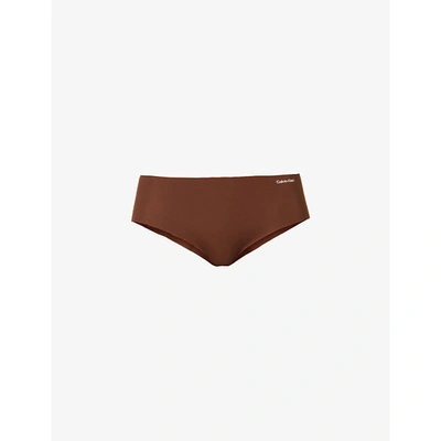 Shop Calvin Klein Invisibles Hipster Briefs In Umber