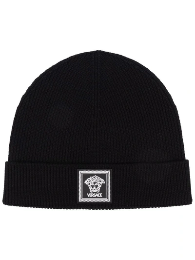 Shop Versace Ribbed Knit Wool Beanie In Black