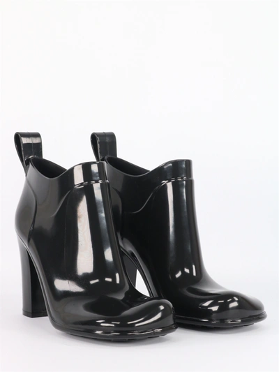 Shop Bottega Veneta Shine Shiny Rubber Ankle Boots In Black