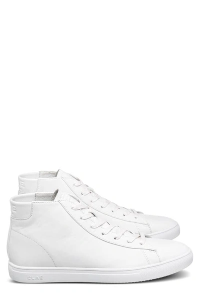 Shop Clae Bradley Mid Sneaker In Triple White Leather